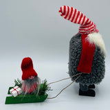 Hand made tomte pulling sled with little tomte