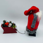 Hand made Tomte pulling Sleigh with Dala horse, Gift and Pines