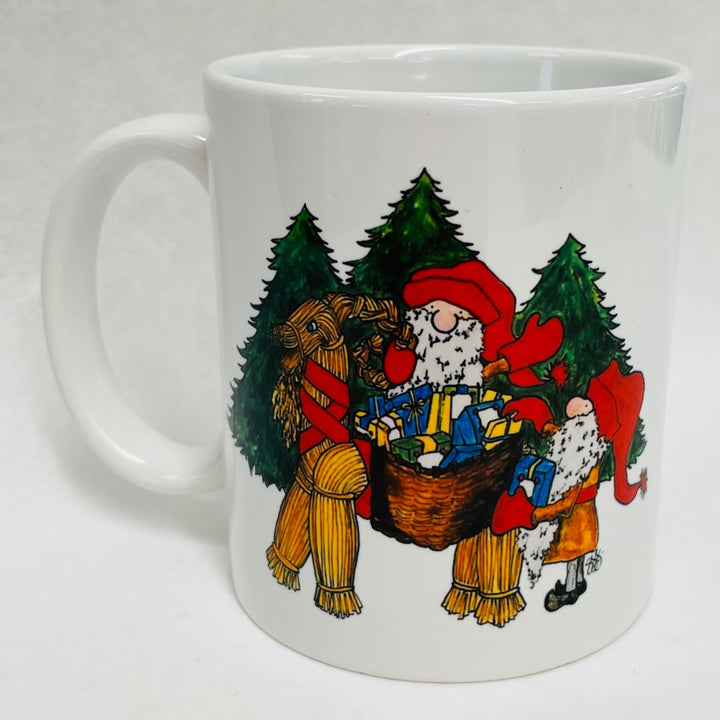 Susan Swanson Swartz Tomte on straw goat coffee mug