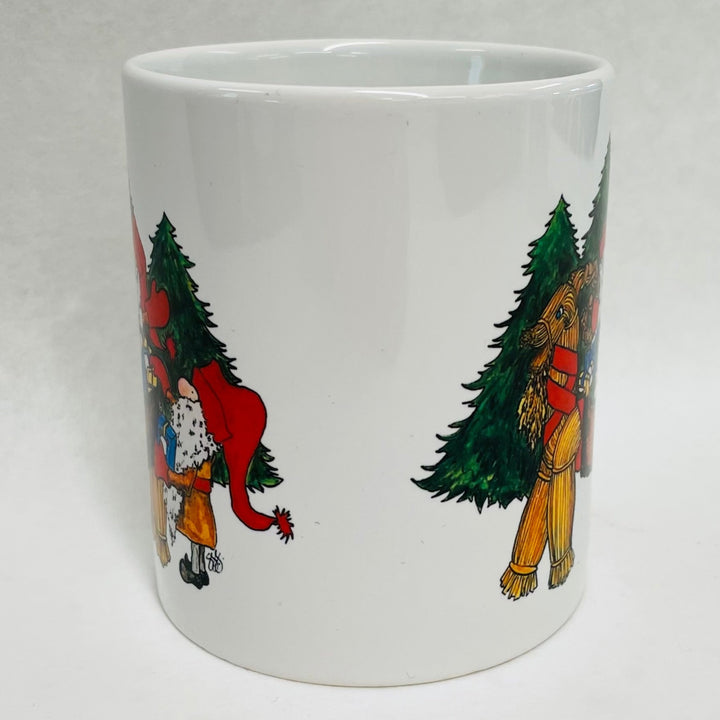 Susan Swanson Swartz Tomte on straw goat coffee mug