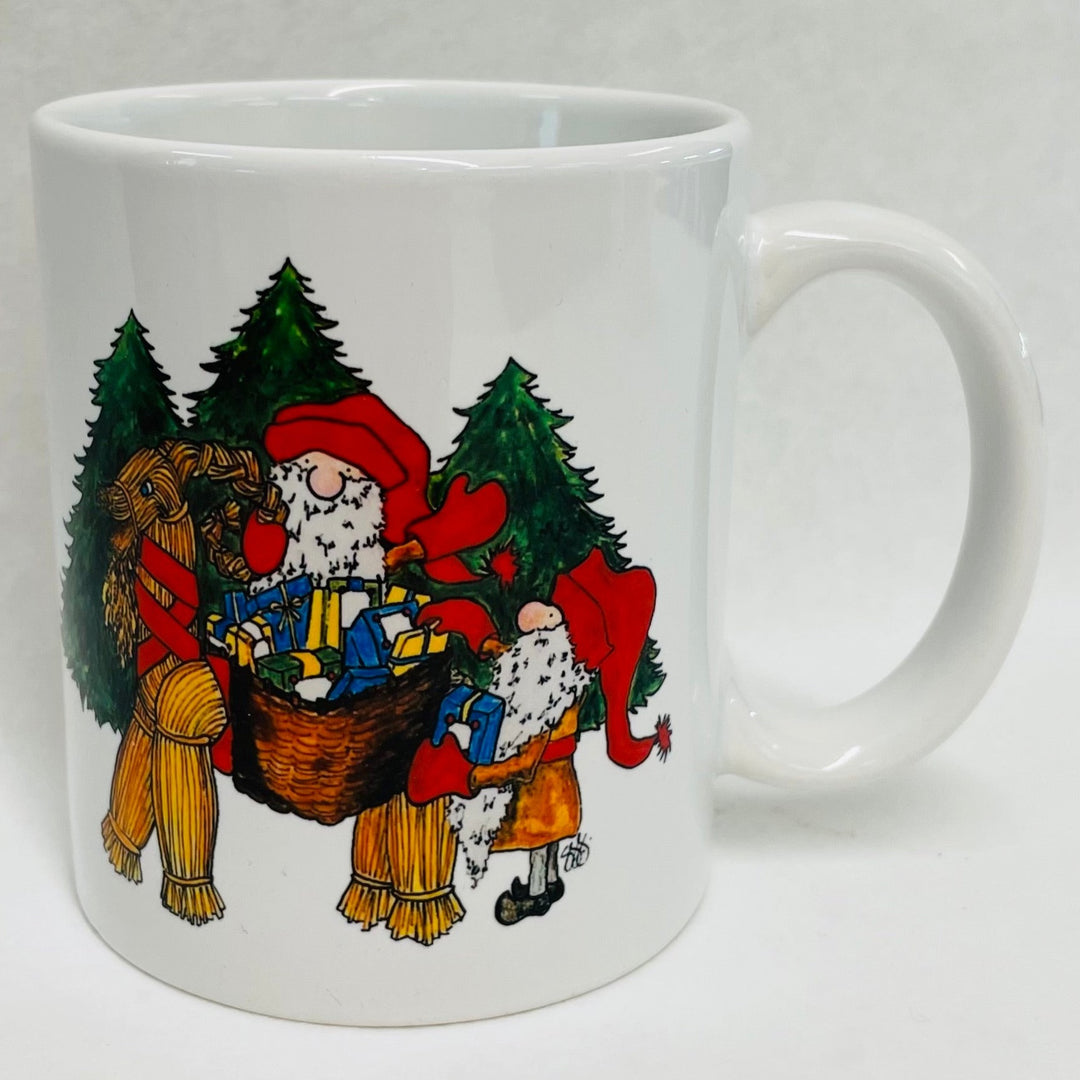 Susan Swanson Swartz Tomte on straw goat coffee mug