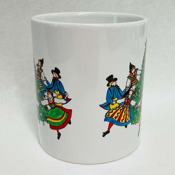 Susan Swanson Swartz Dancing around the tree coffee mug