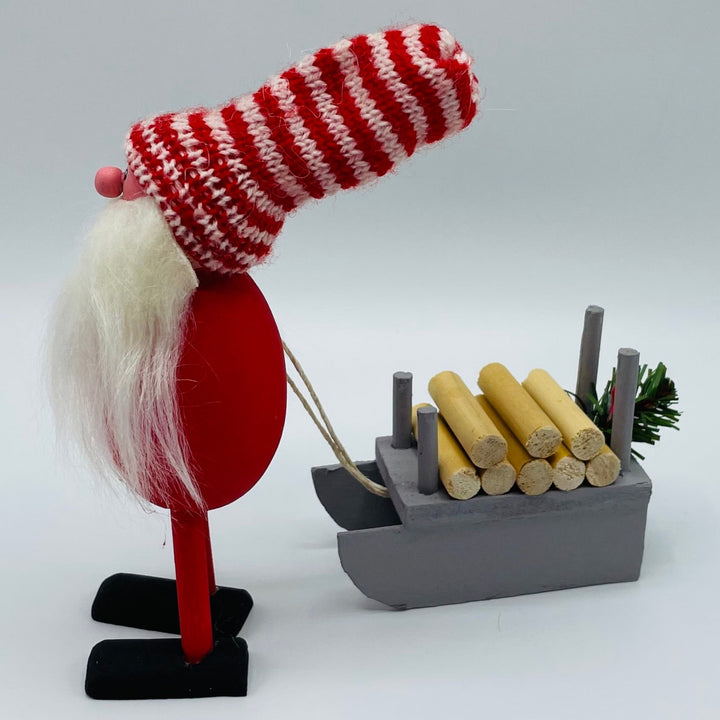 Hand made Tomte pulling Sled with logs