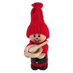 Swedish tomte holding bowl with spoon