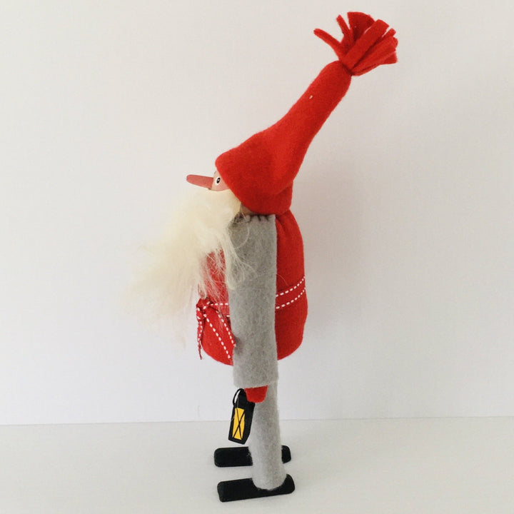 Hand made tomte holding lantern & gift