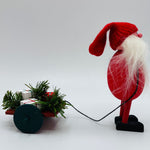 Hand made Tomte pulling sled with 3 gifts & greenery