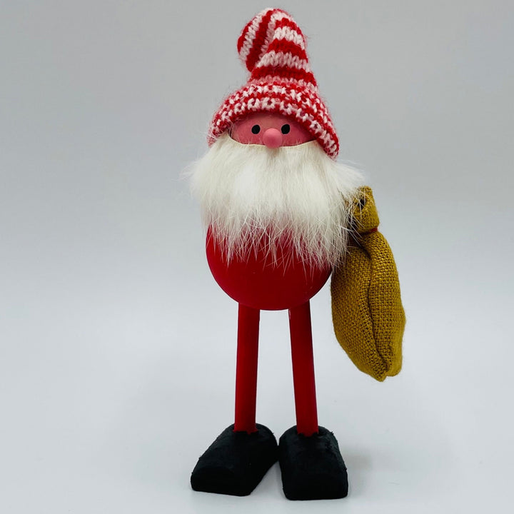 Hand made Tomte carrying a sack