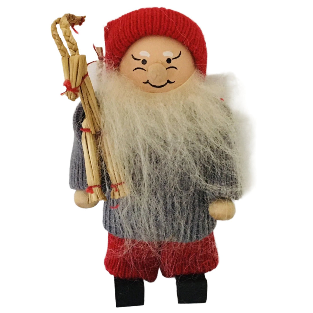 Swedish tomte holding a straw goat