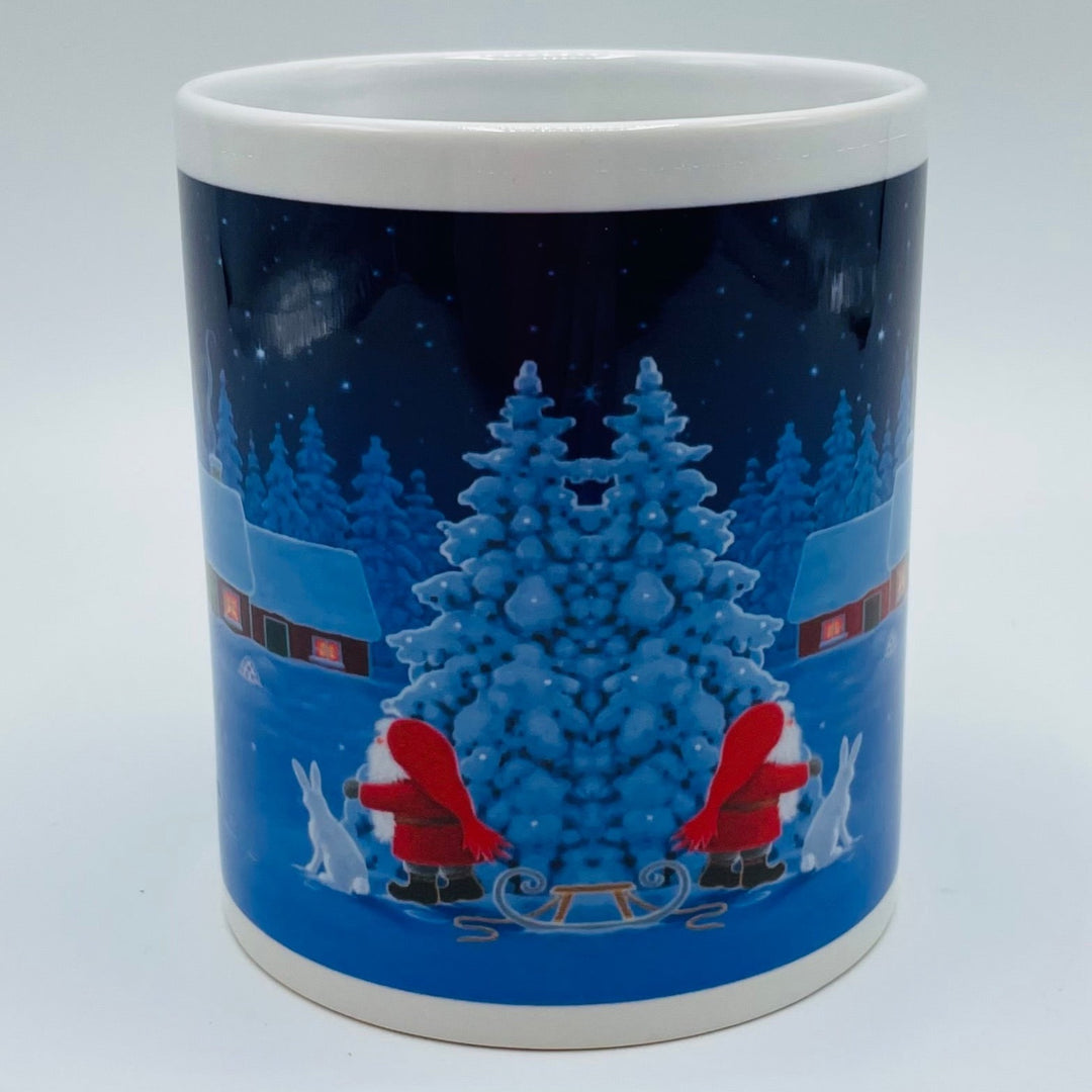 Eva Melhuish Tomte, rabbit & tree at snowy cabin coffee mug