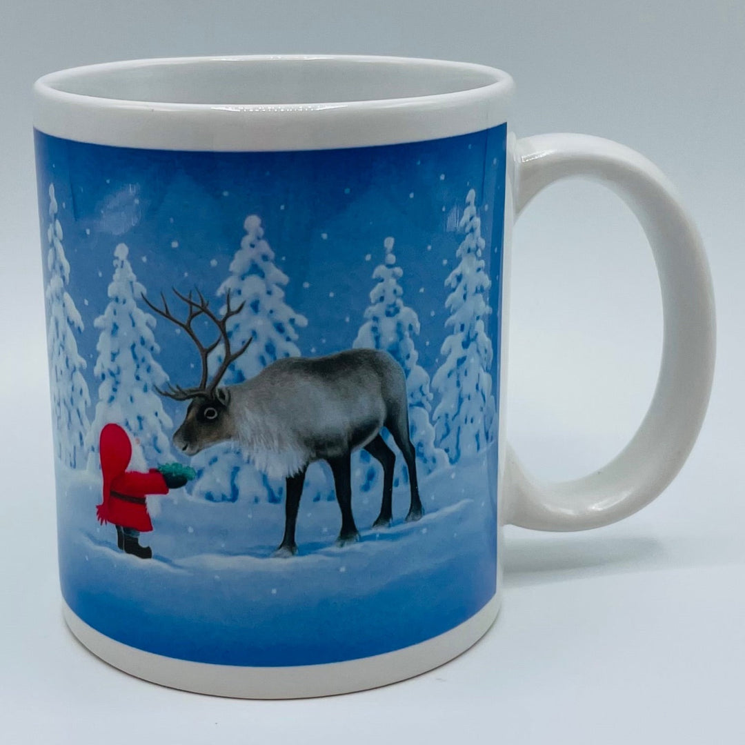 Eva Melhuish Tomte feeding reindeer coffee mug