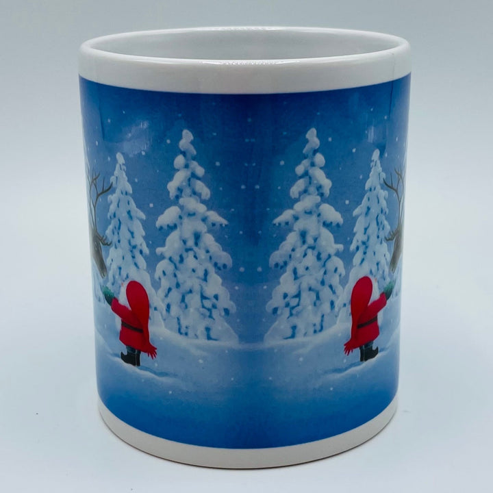 Eva Melhuish Tomte feeding reindeer coffee mug