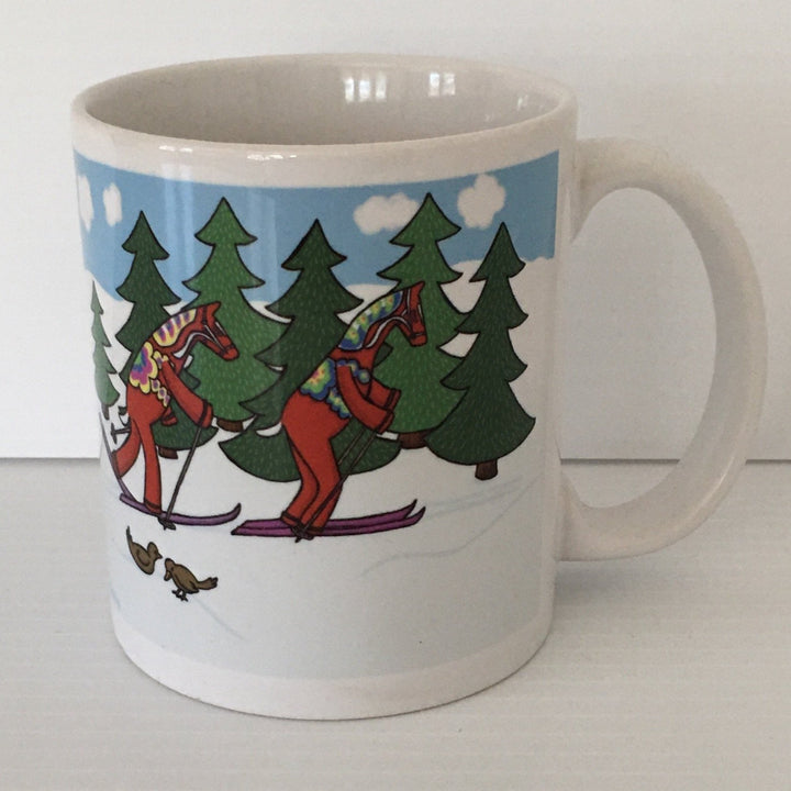 Karin Didring Dala Horses crossing country skiing coffee mug