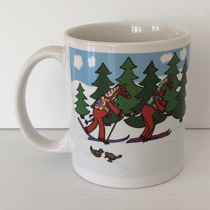 Karin Didring Dala Horses crossing country skiing coffee mug