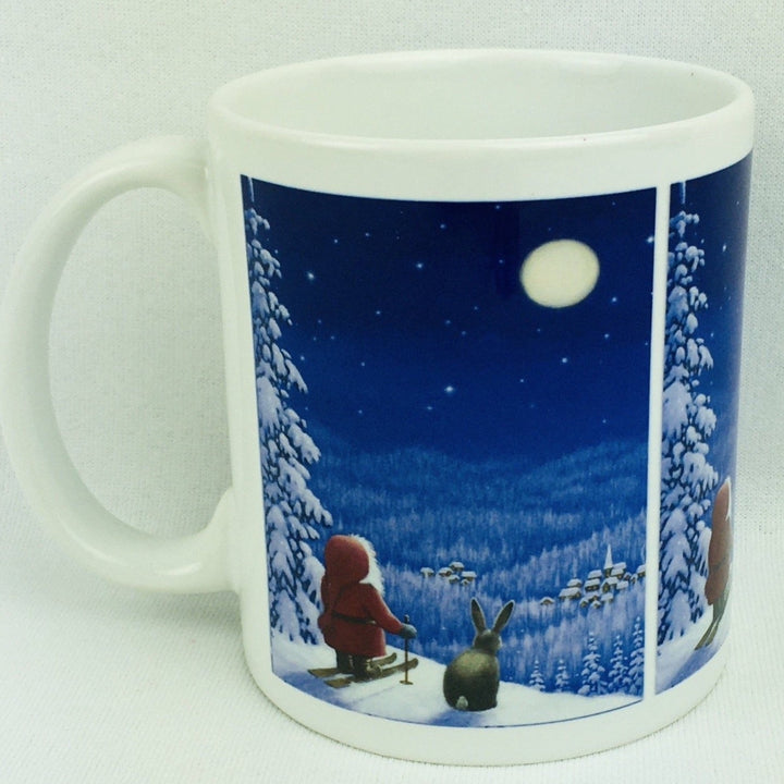 Eva Melhuish Tomte on Skiis with Bunny coffee mug