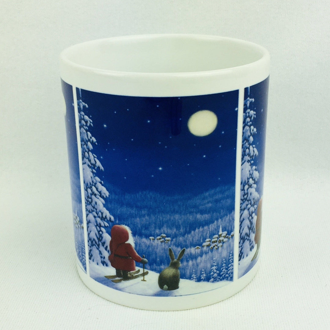 Eva Melhuish Tomte on Skiis with Bunny coffee mug