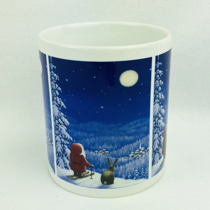 Eva Melhuish Tomte on Skiis with Bunny coffee mug