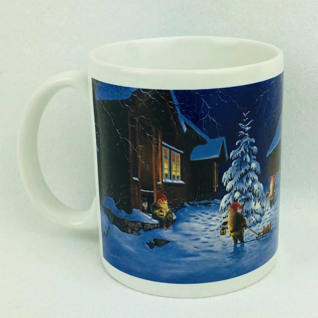 Jan Bergerlind Tomte sitting on porch coffee mug