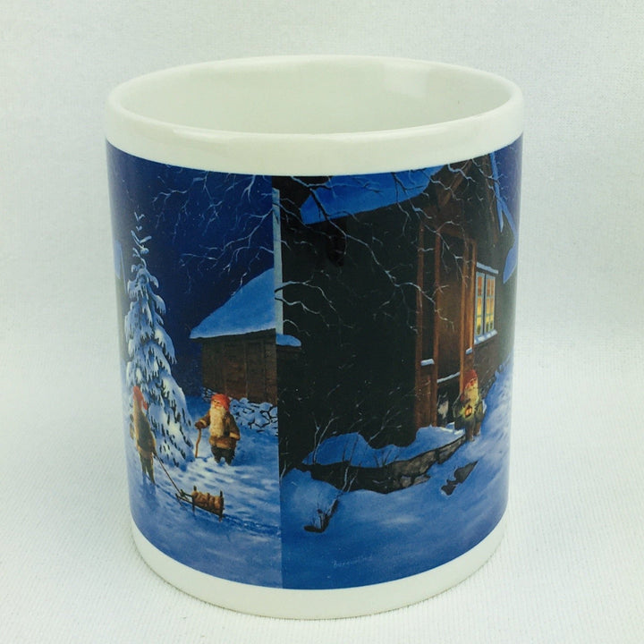 Jan Bergerlind Tomte sitting on porch coffee mug