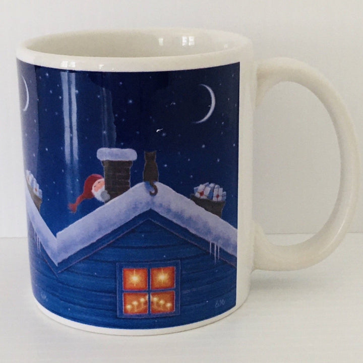 Eva Melhuish Tomte & cat on roof top coffee mug