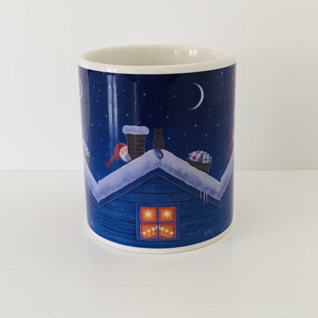 Eva Melhuish Tomte & cat on roof top coffee mug