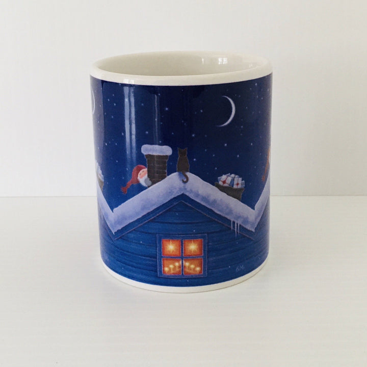 Eva Melhuish Tomte & cat on roof top coffee mug