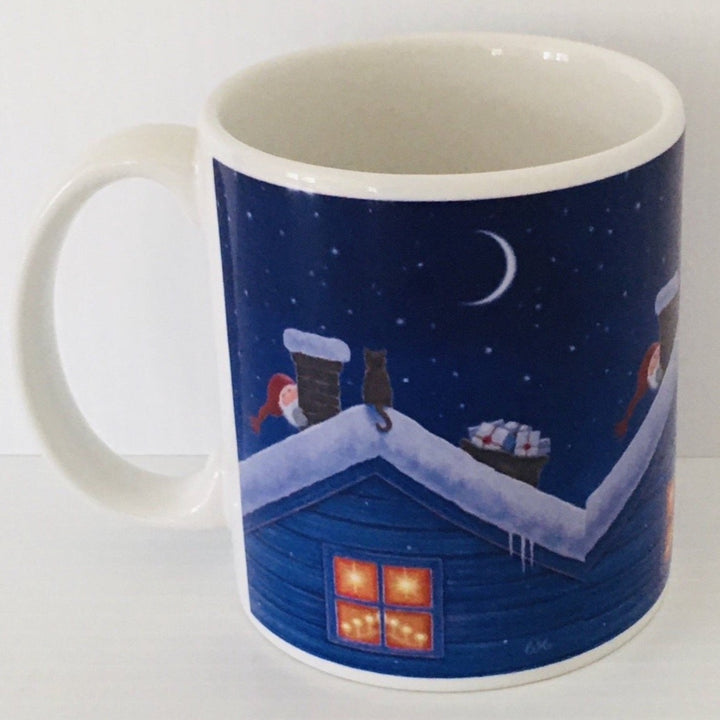 Eva Melhuish Tomte & cat on roof top coffee mug