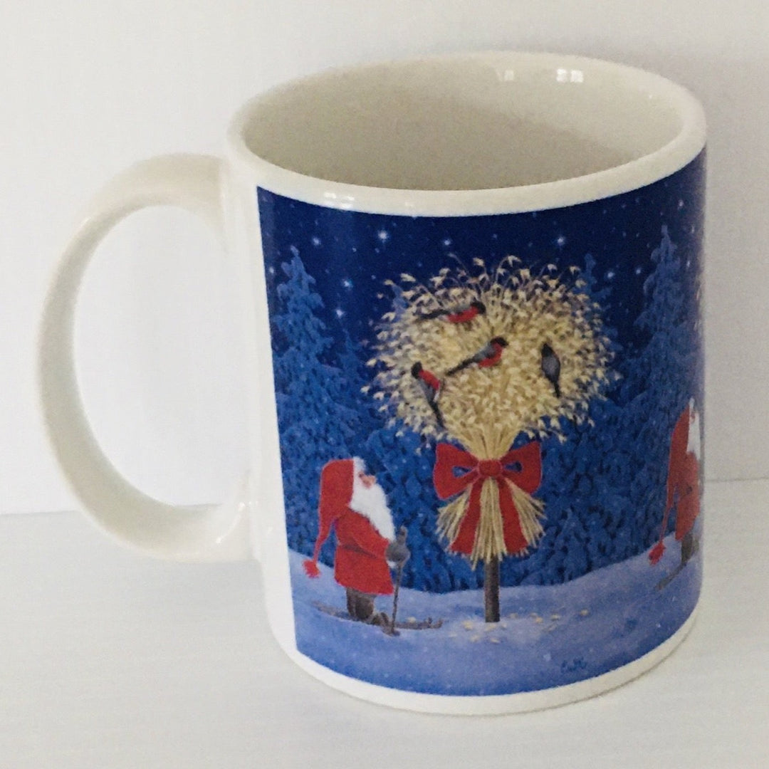 Eva Melhuish Tomte with Jul Neg and Birds coffee mug