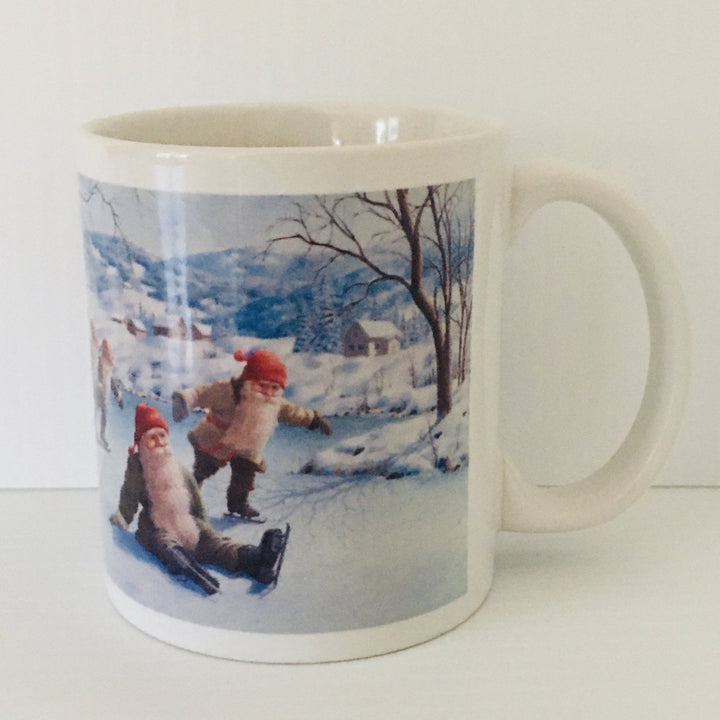 Jan Bergerlind Skating Tomtar coffee mug