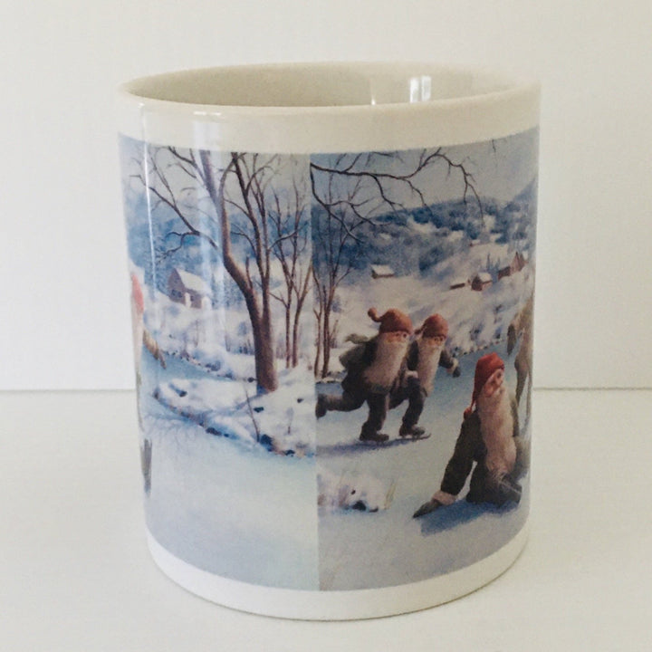 Jan Bergerlind Skating Tomtar coffee mug