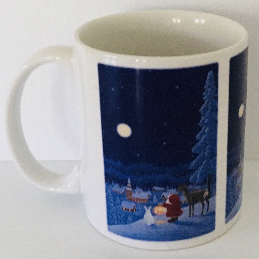 Eva Melhuish Tomte with deer and rabbit coffee mug