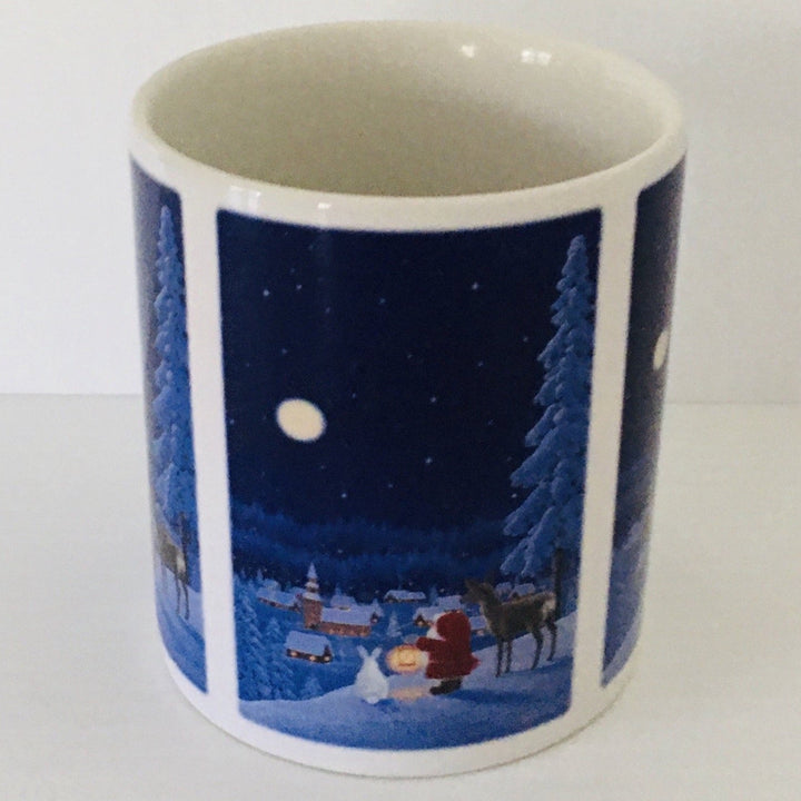 Eva Melhuish Tomte with deer and rabbit coffee mug