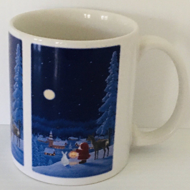 Eva Melhuish Tomte with deer and rabbit coffee mug