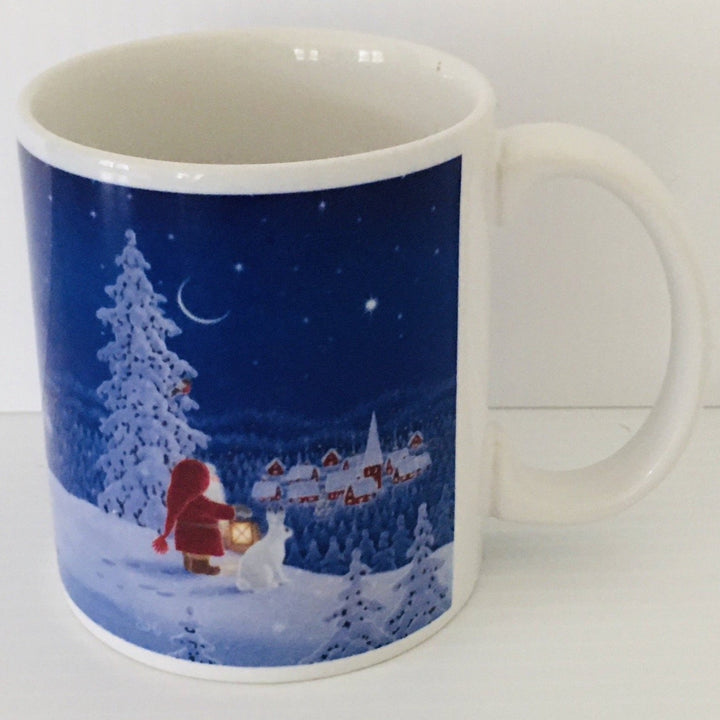 Eva Melhuish Santa and bunny overlooking village coffee mug