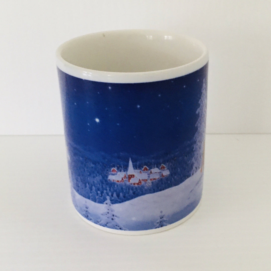 Eva Melhuish Santa and bunny overlooking village coffee mug