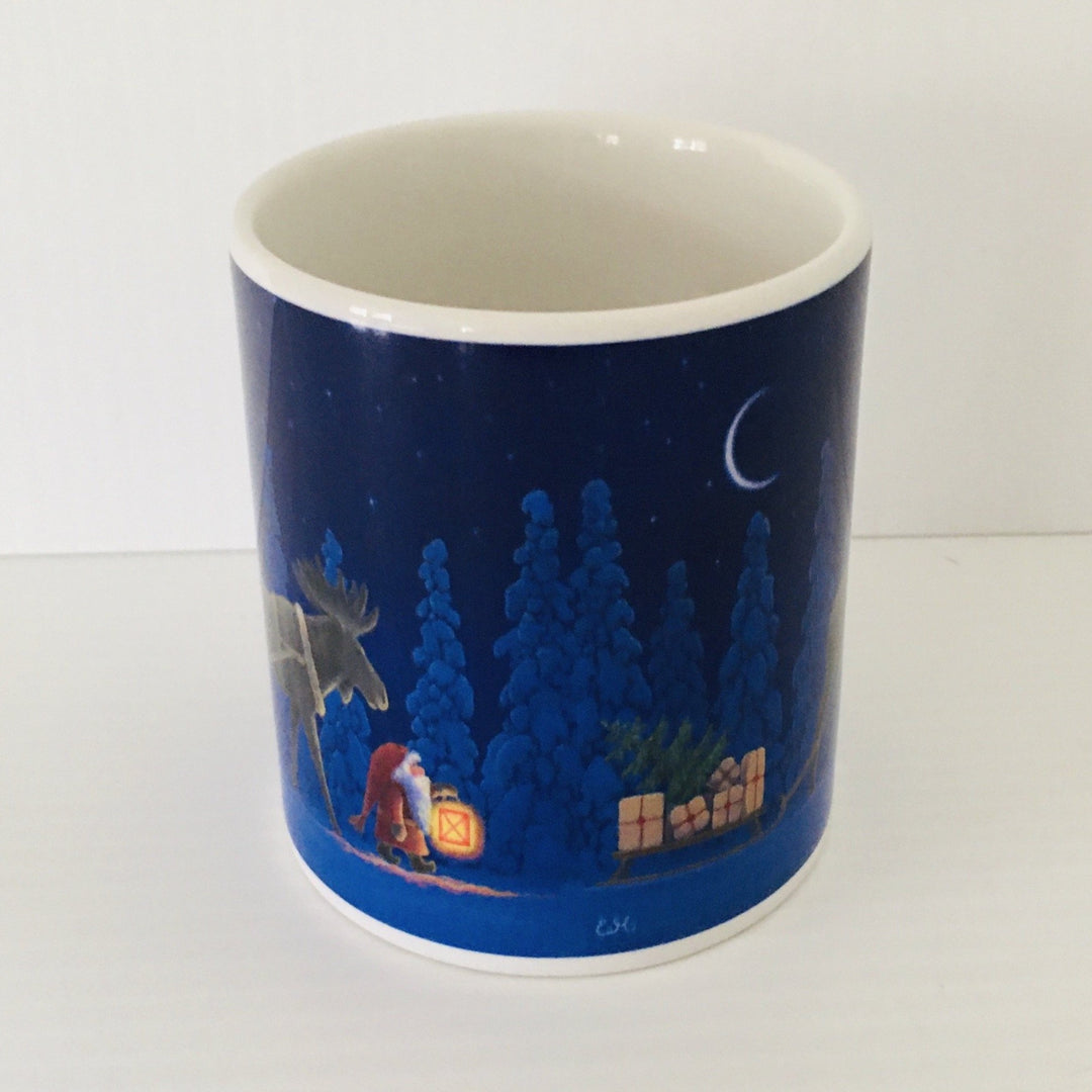 Eva Melhuish Moose pulling sled coffee mug