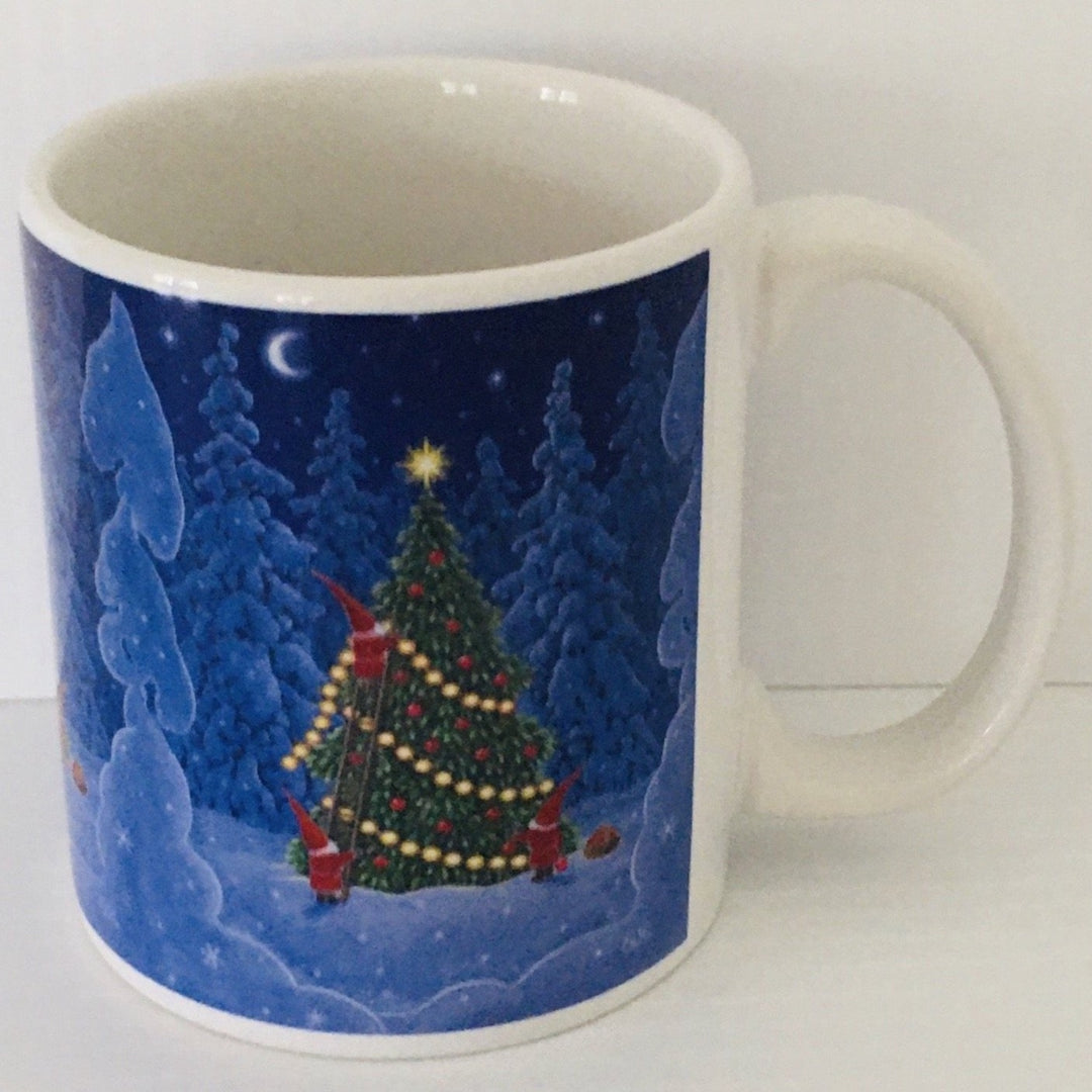 Eva Melhuish Decorating tree coffee mug