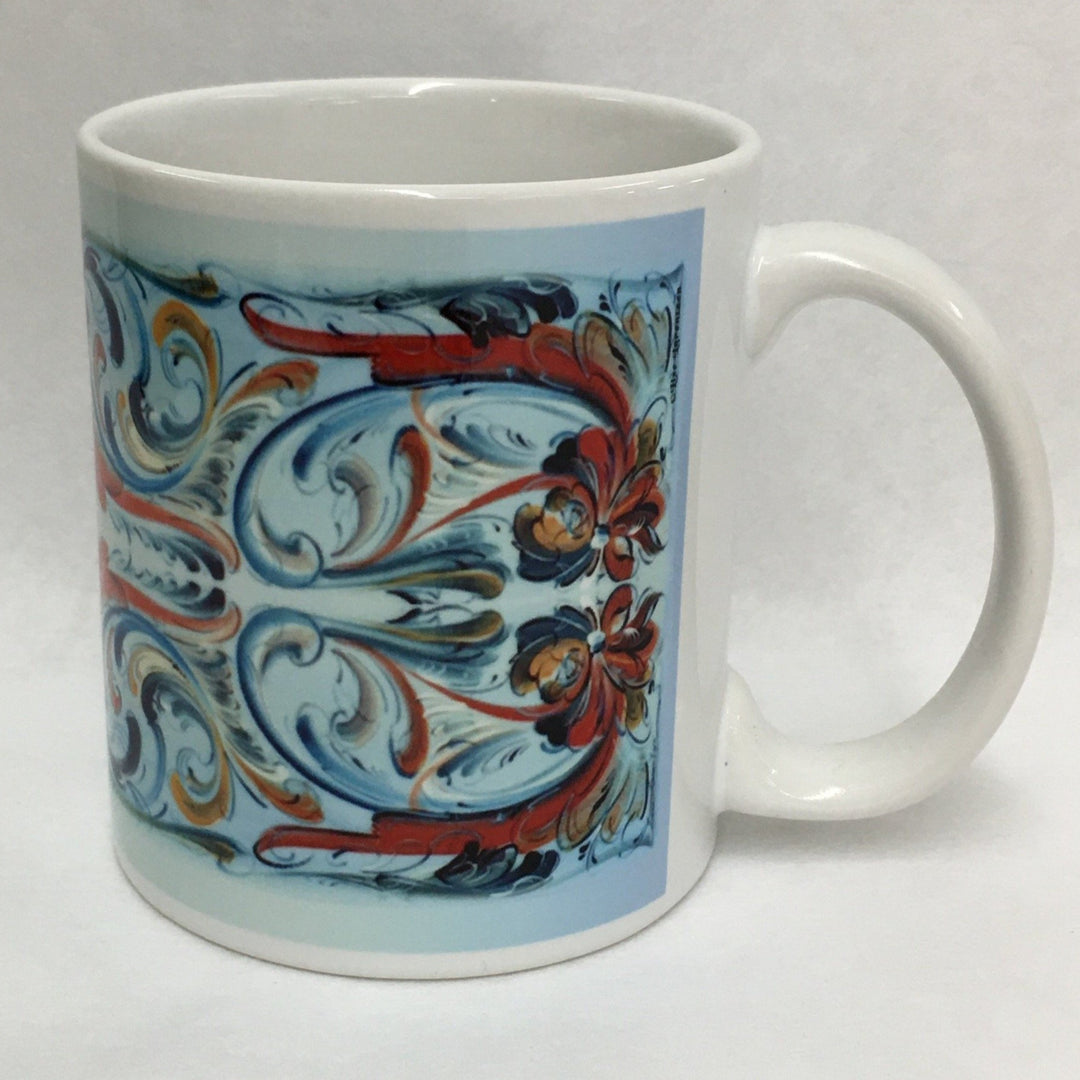 Lise Lorentzen Rosemaling on Light Blue coffee mug