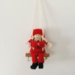 Swedish tomte on swing  ornament