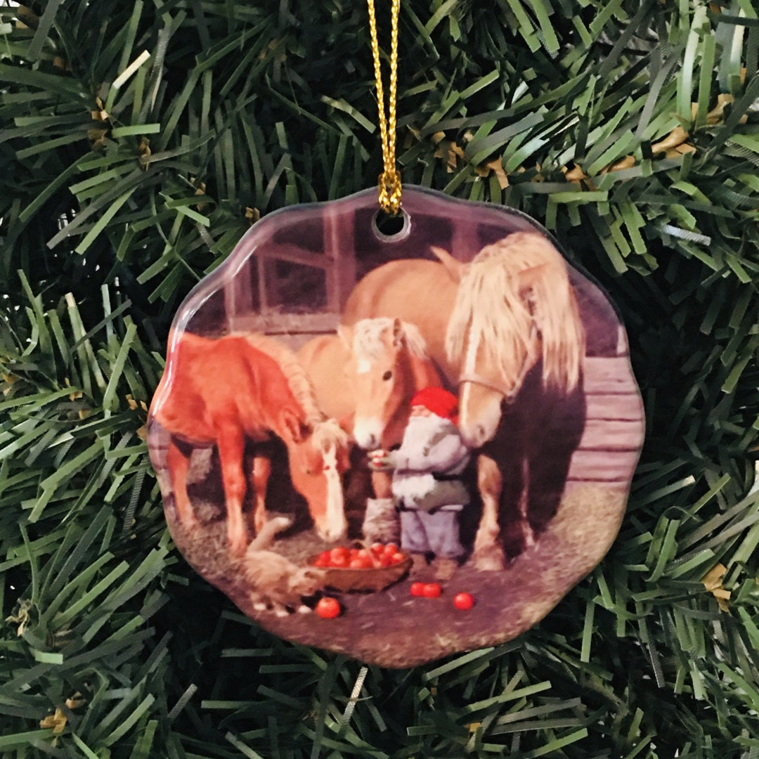 Ceramic Ornament, Jan Bergerlind Tomte feeding apples to horses