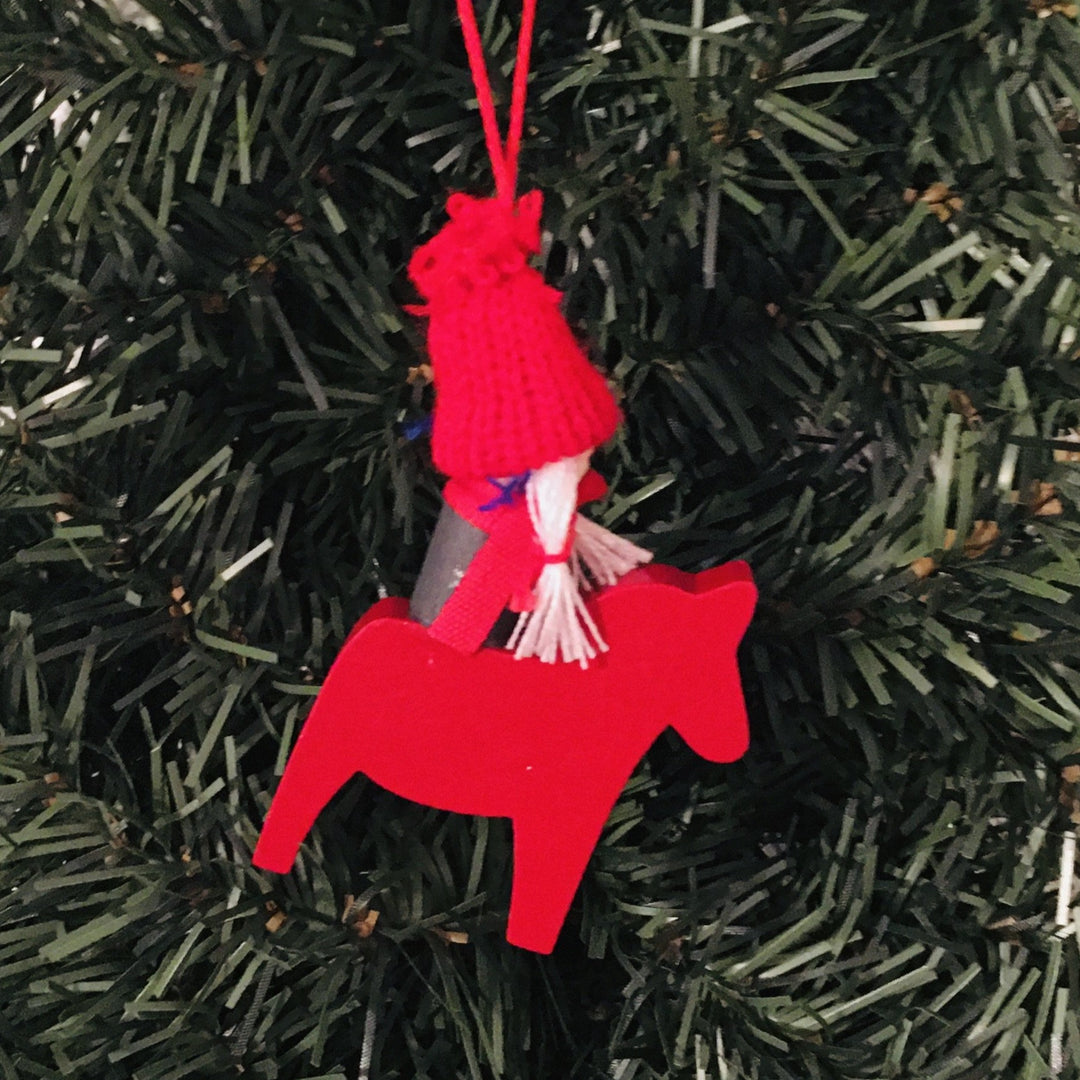 Tomte Girl on Red Dala Horse Ornament