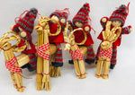 Gnomes riding straw goat ornaments - Set of 4