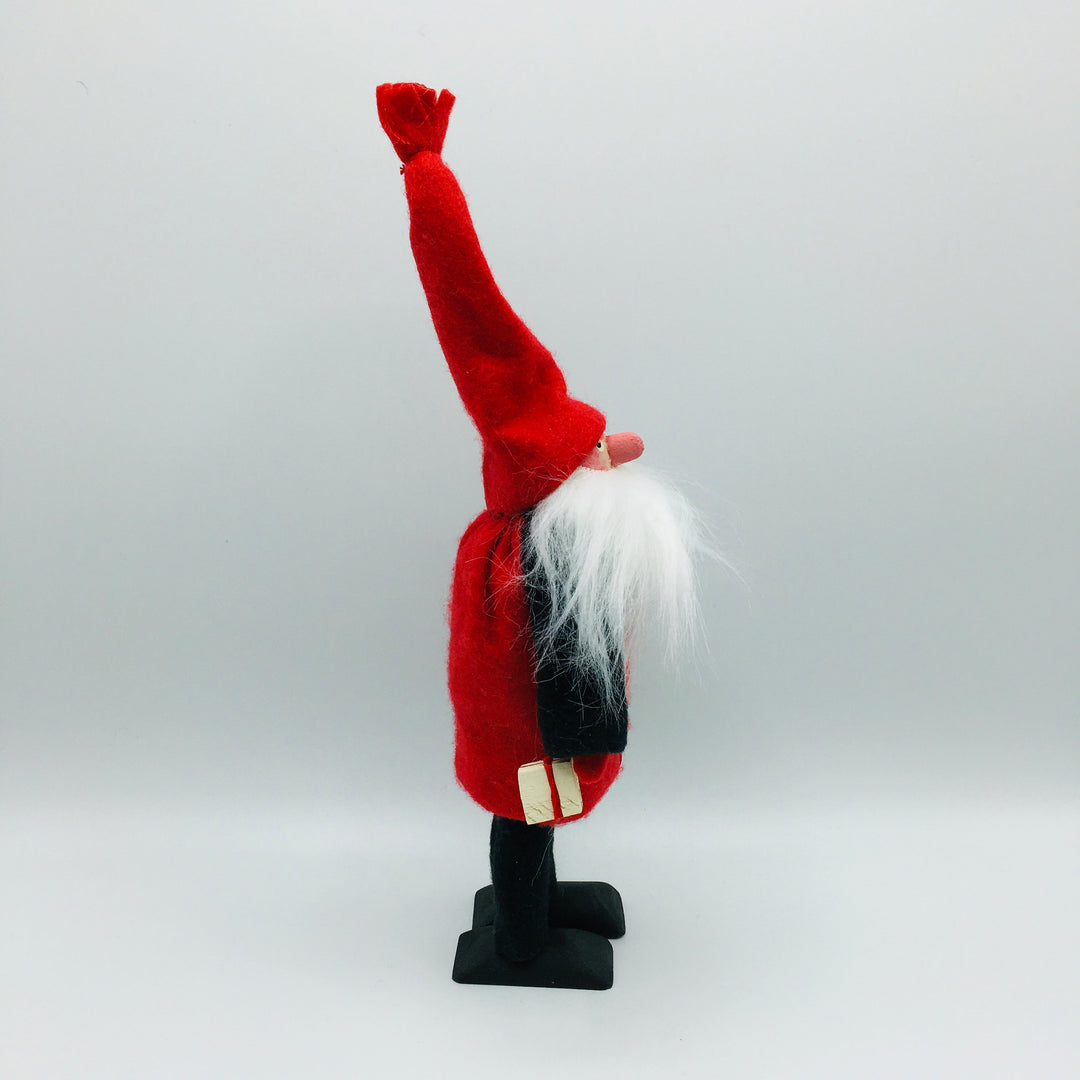 Hand made tomte holding a lantern & gift