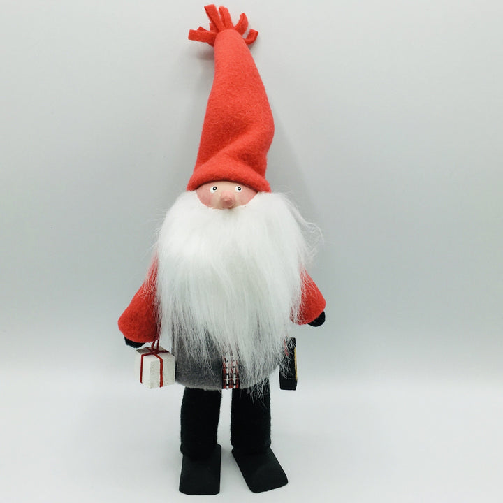 Hand made tomte holding a lantern & gift