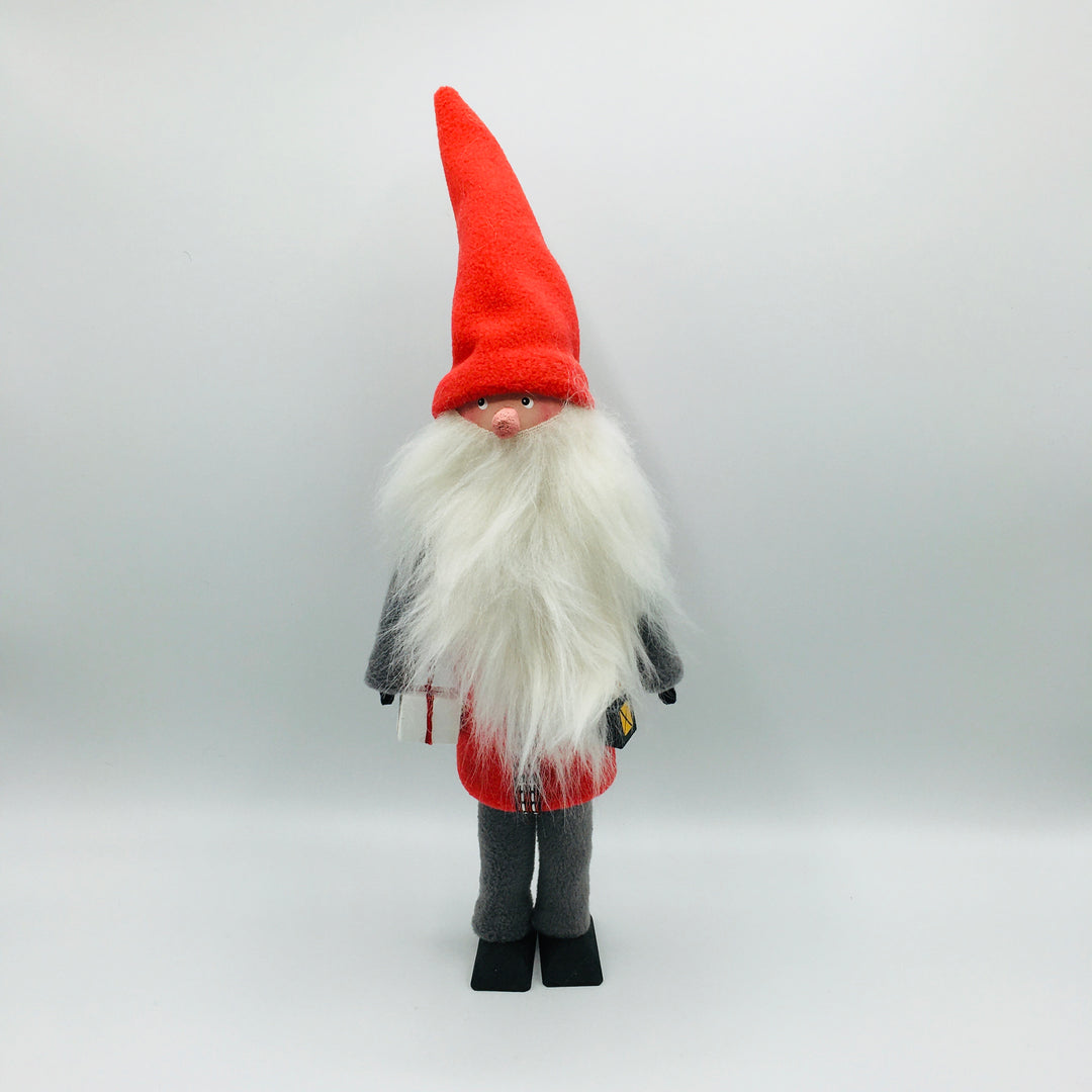 Hand made tomte holding a lantern & gift