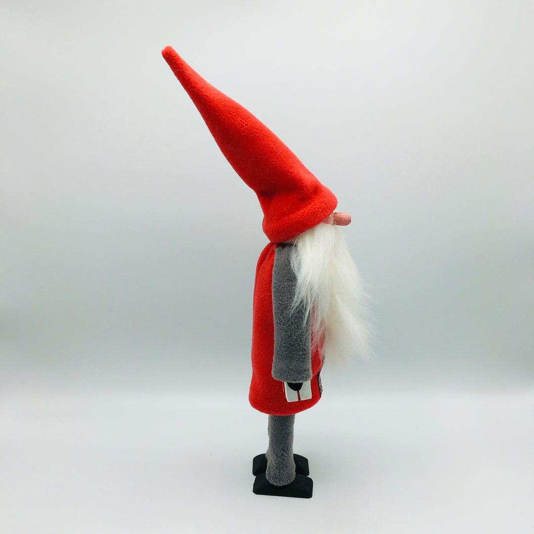 Hand made tomte holding a lantern & gift