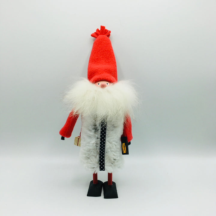 Hand made tomte holding a lantern & gift