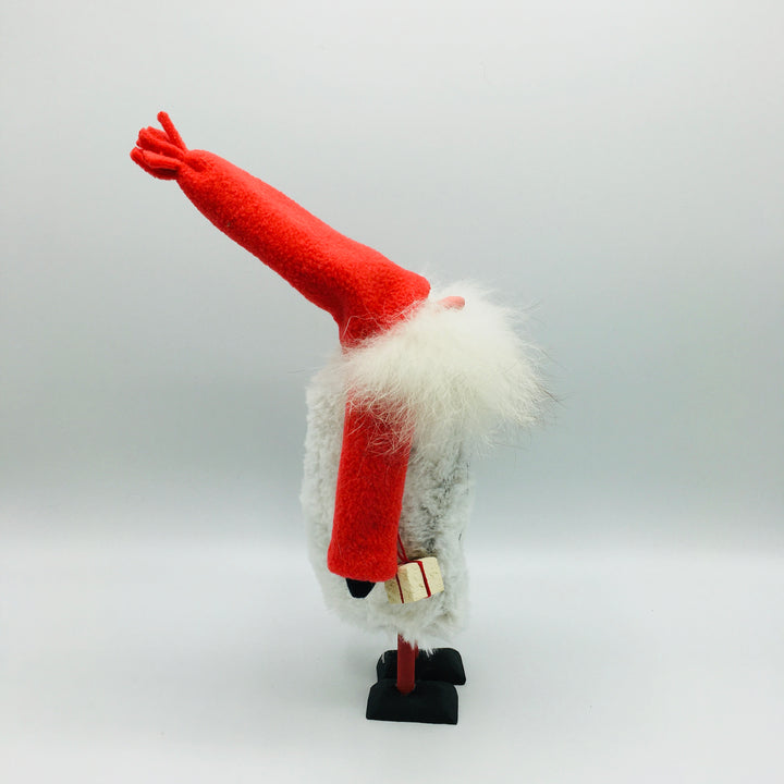 Hand made tomte holding a lantern & gift