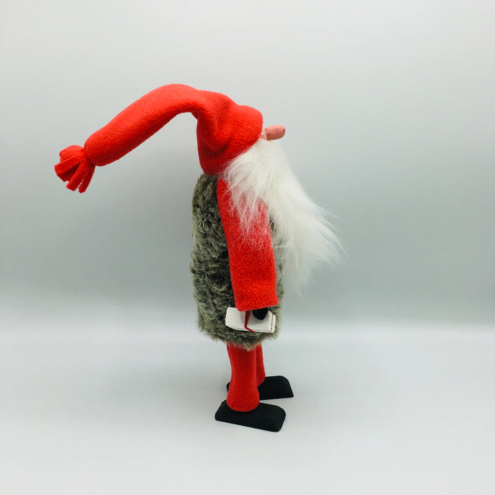 Hand made tomte holding a lantern & gift