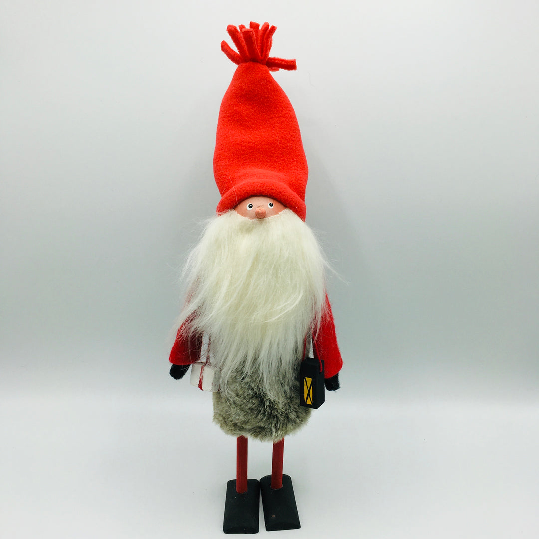 Hand made tomte holding a lantern & gift