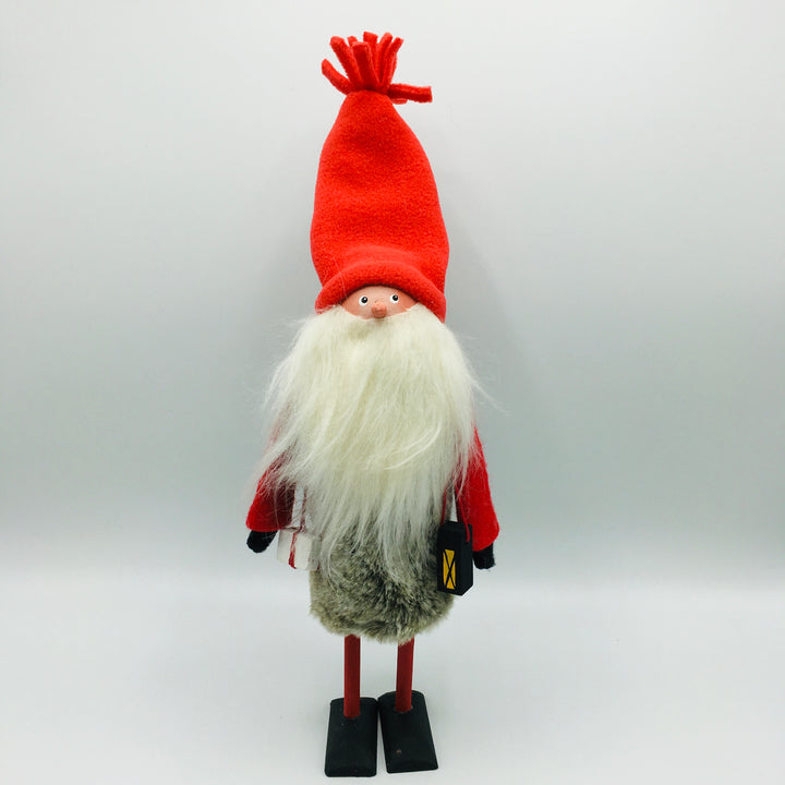 Hand made tomte holding a lantern & gift